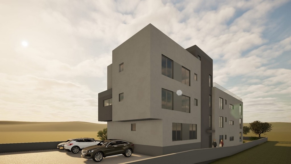 New residential building with parking spaces in front of the building