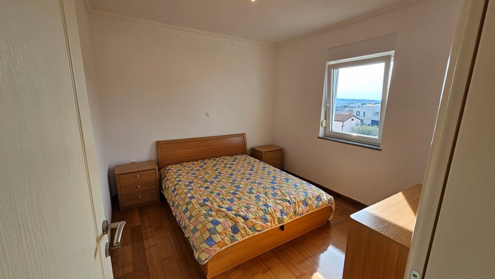Bedroom with double bed and sea view