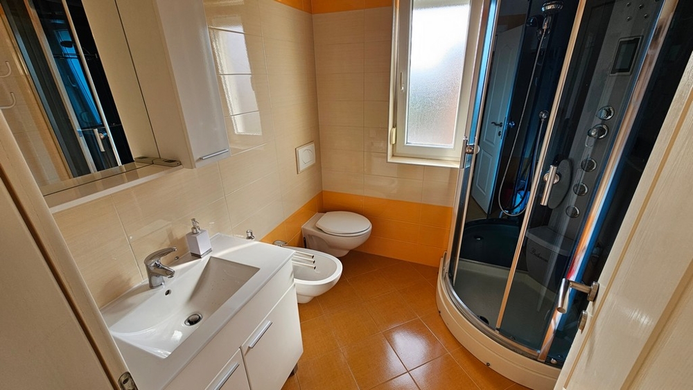 Bathroom with shower in apartment in Novigrad