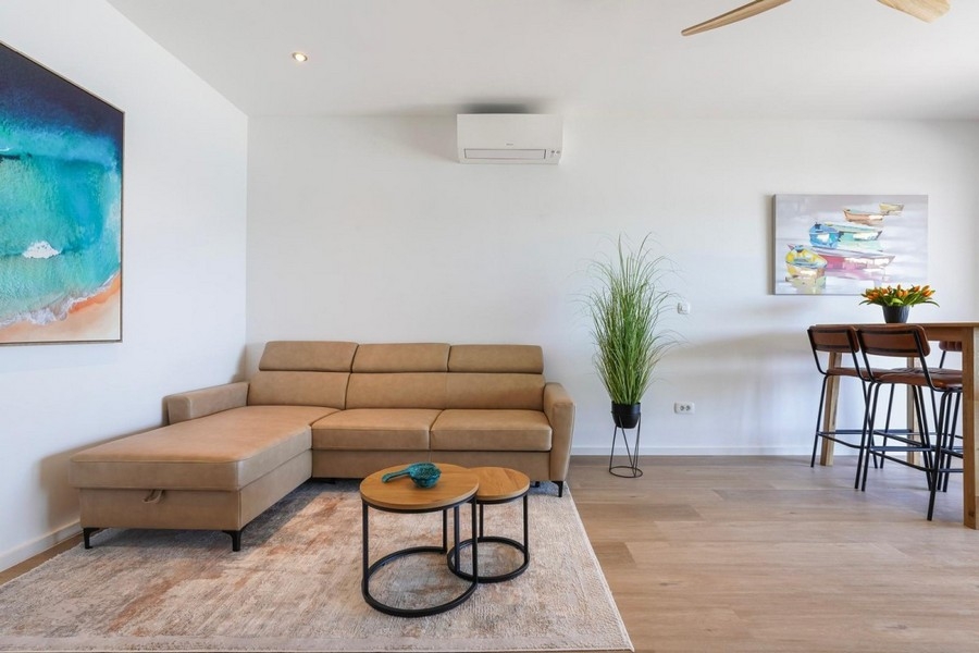 Bright living area in modern seaside apartment