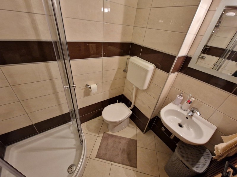 Bathroom with shower and sink