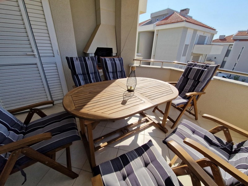 Balcony with grill of apartment A3900, which is for sale in Croatia in Novalja.