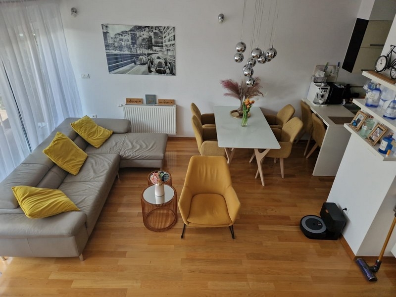 Living area with sofa and dining area