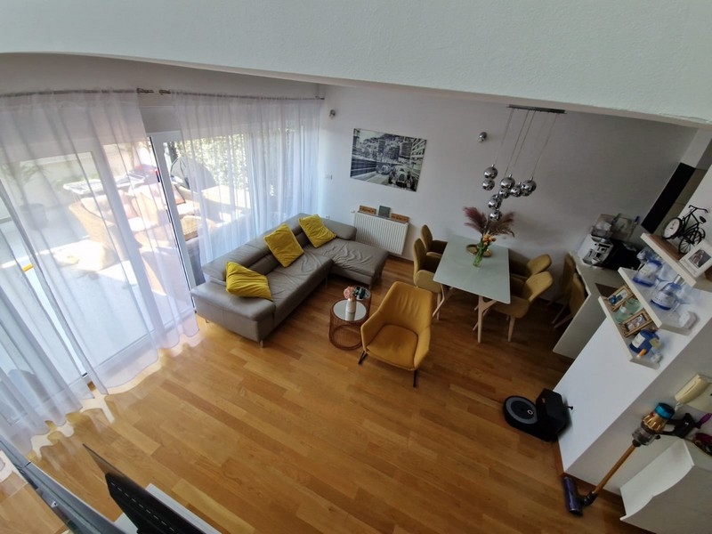 Open living room with access to the terrace