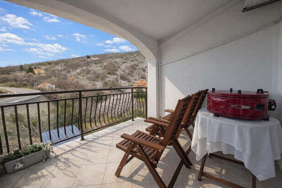 The covered terrace of apartment A3906 in Senj, Kvarner Bay.