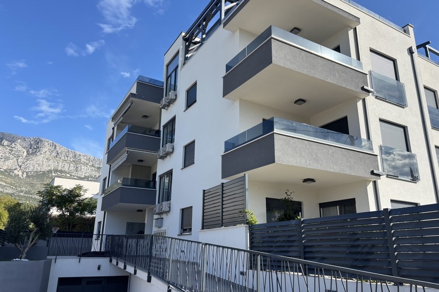 Modern residential complex with balconies and exterior views