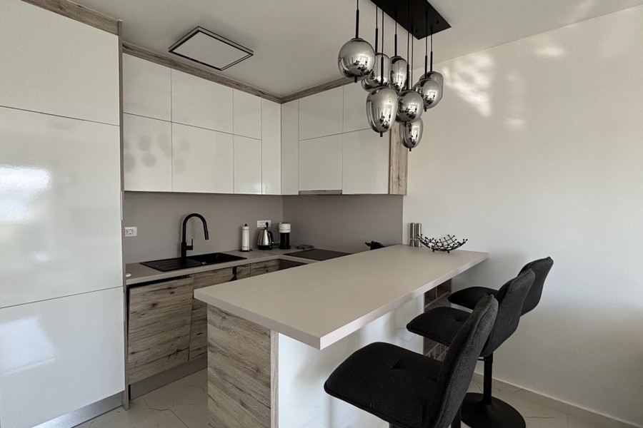 Modern kitchen with island and bar stools
