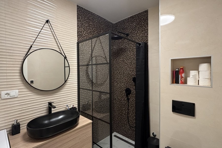 Modern bathroom with shower and sink