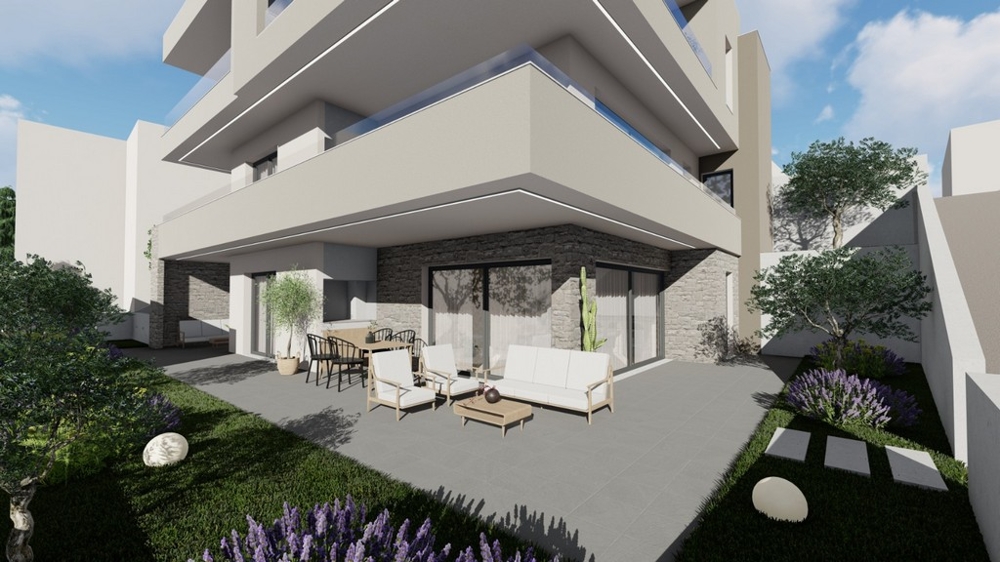 Covered terrace with lounge furniture and a view of the countryside