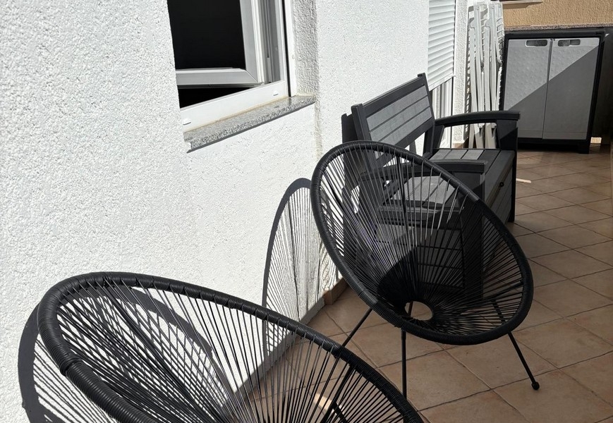 Balcony with seating and views of the surrounding area