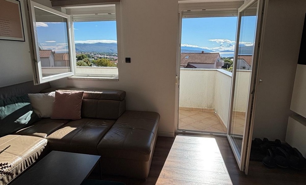 Kitchen with adjoining dining area and modern equipment