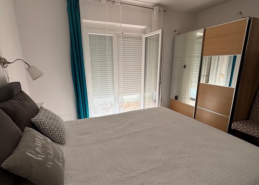 Walk-in closet with shelves and storage space