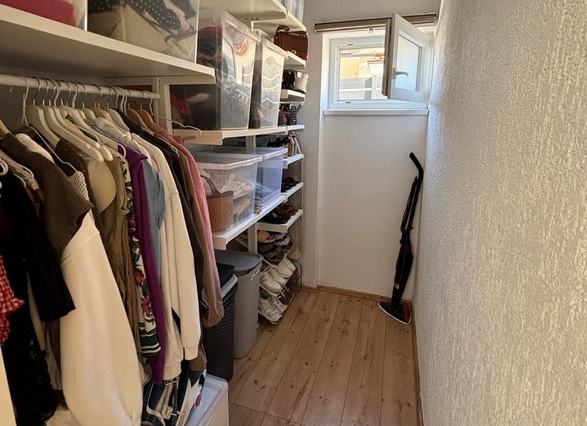 Internal staircase with wooden steps to the upper floor