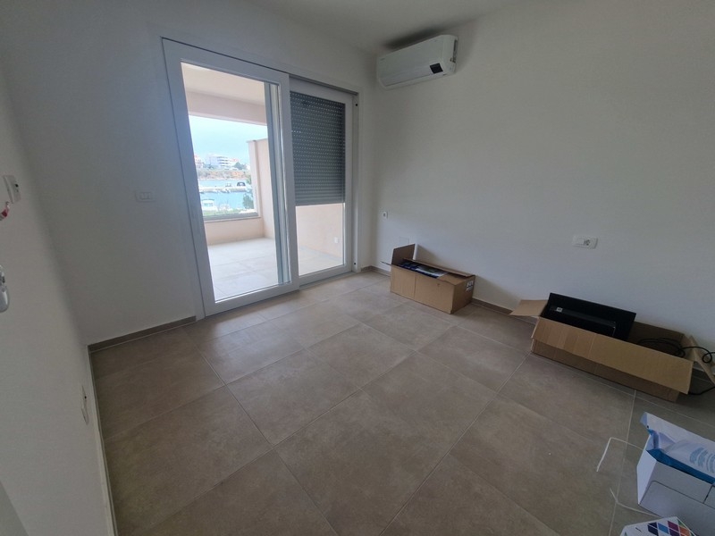 Bedroom with air conditioning and balcony access