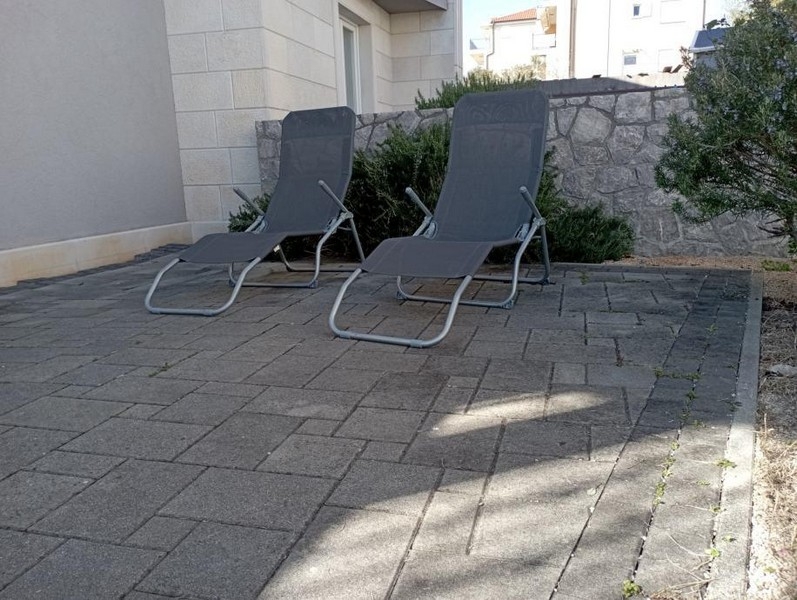 Terrace with sun loungers of property A3913 in Croatia - Panorama Scouting.