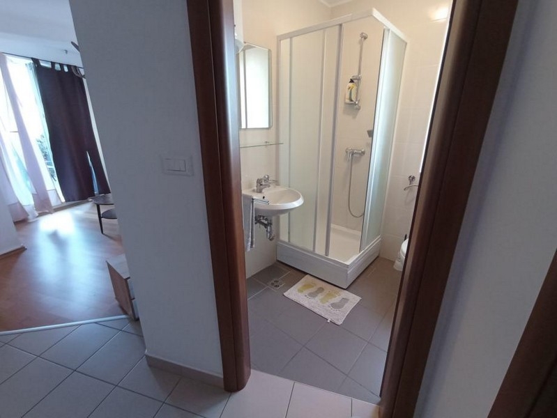 Bathroom with shower and sink