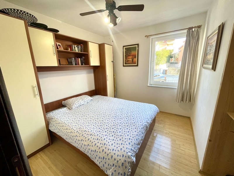 Bedroom with double bed and built-in wardrobe