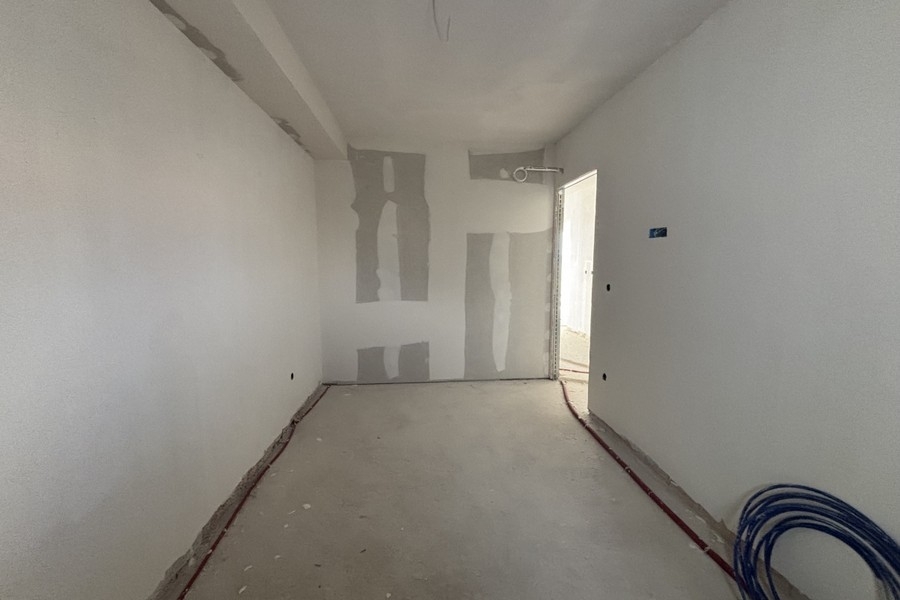 Unfinished interior with installations for kitchen or bathroom