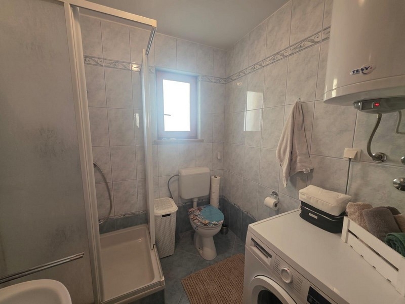 Basement studio with open space and kitchenette