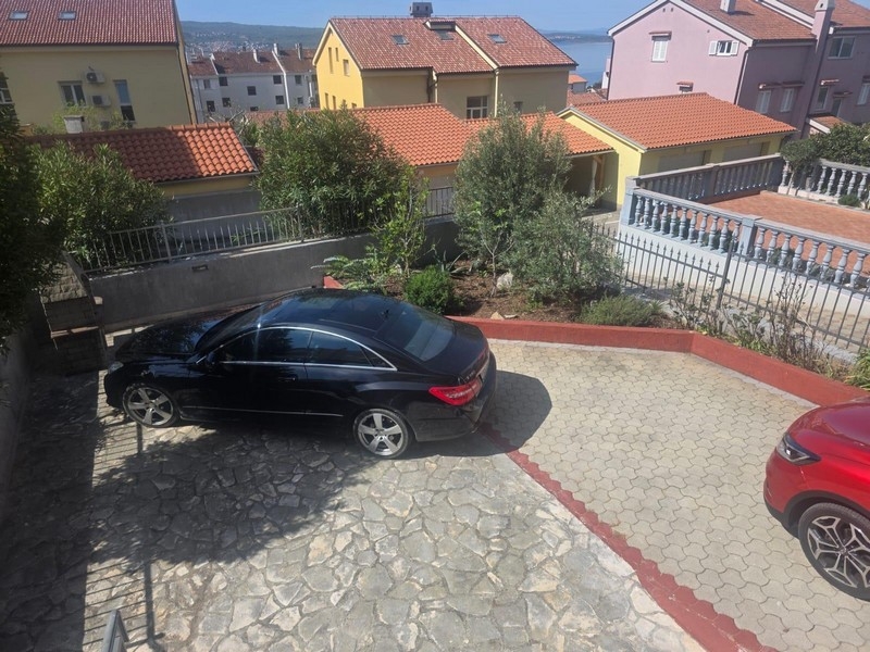 Views over the neighborhood with partial ocean views