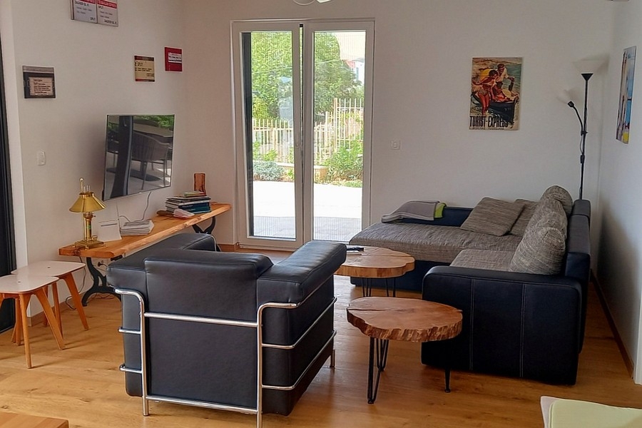 Bright living area with access to the terrace and modern furnishings