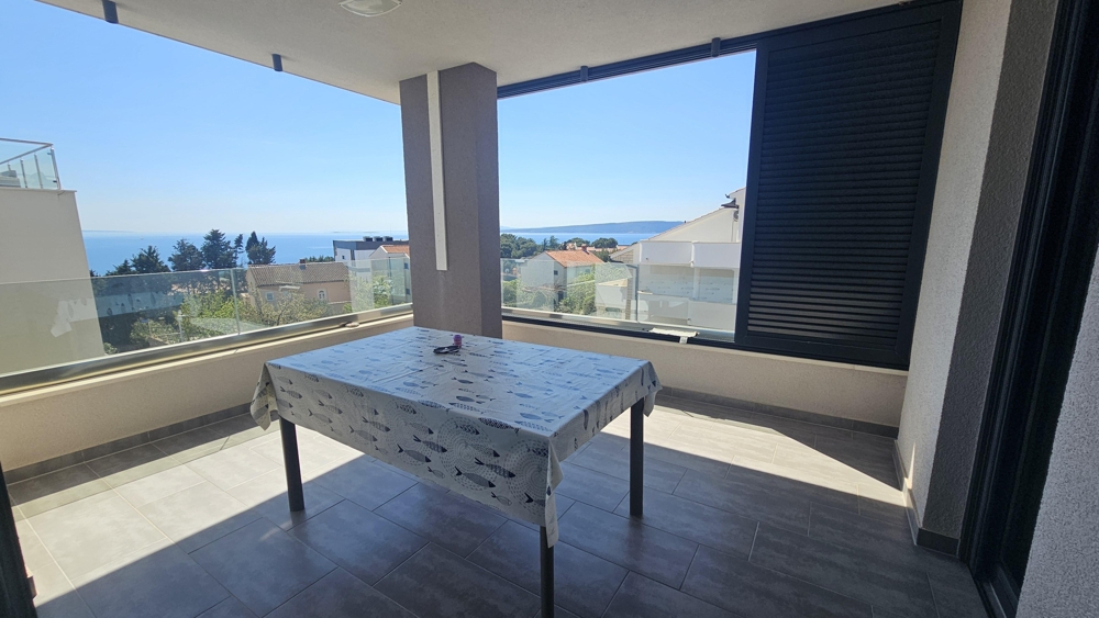 Large covered balcony with sea view and view of Krk
