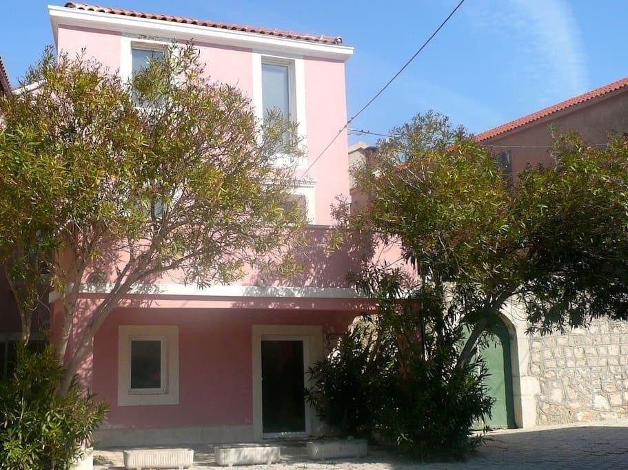 House facade of property A3932 in a quiet coastal location in Croatia