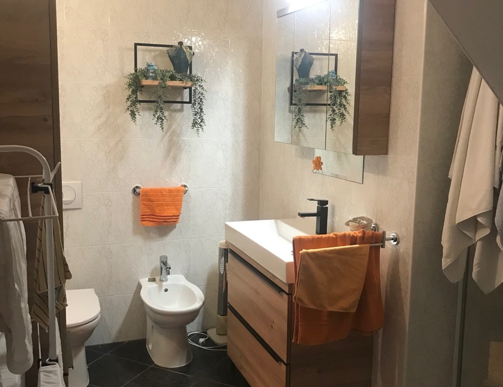 Bathroom with shower and sink