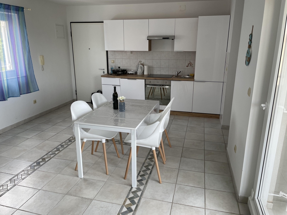 Kitchen with dining area and modern equipment