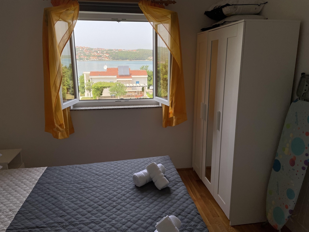 Sea view bedroom with window