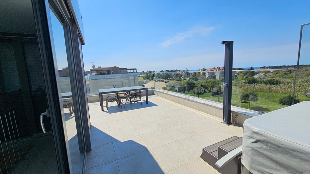 Roof terrace with sea views of the offer A3937 in Istria.