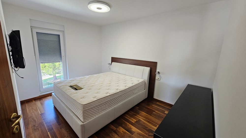 Bedroom with double bed and window