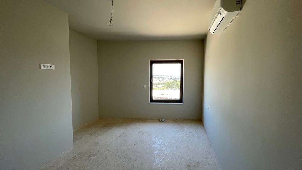Bedroom with air conditioning and partial sea view