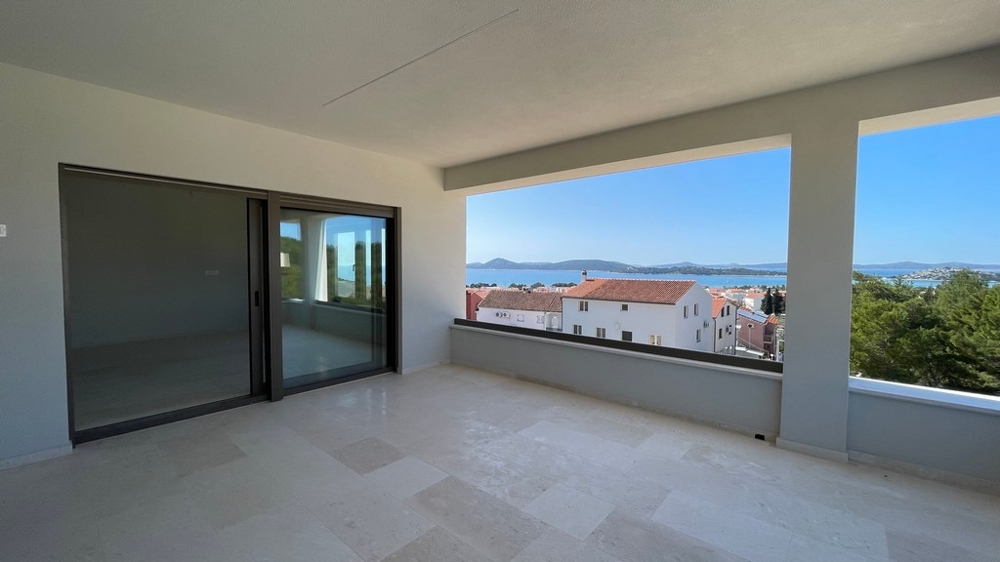 Covered terrace with panoramic sea views and coastline