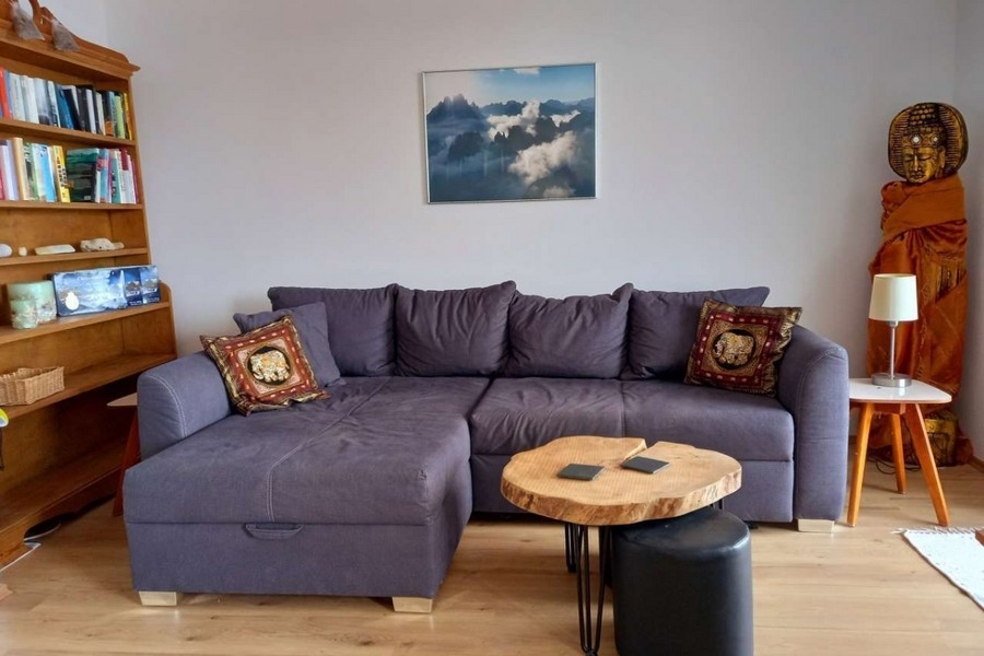 Living area with corner sofa and shelf