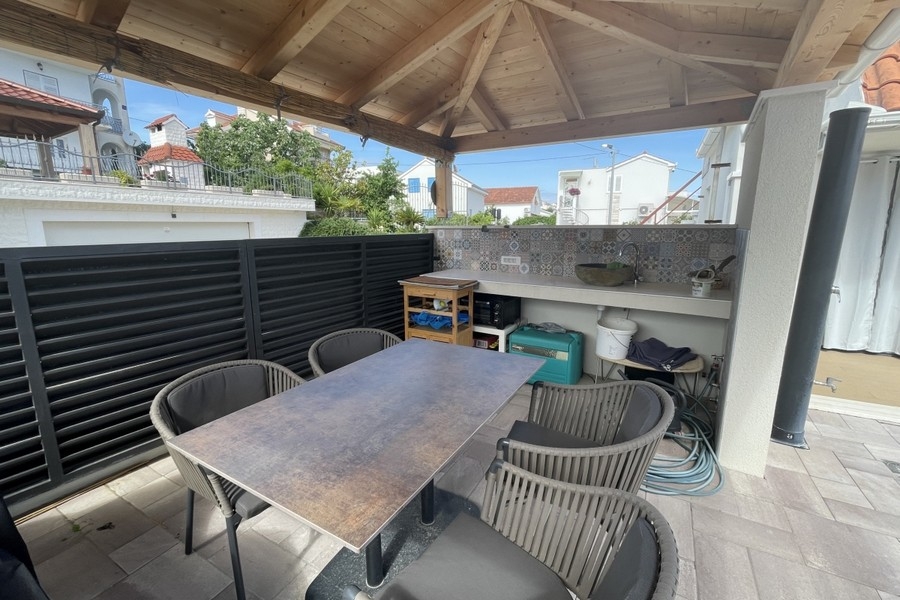 Outdoor area with seating and barbecue area