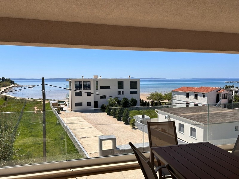 View of the beach from the covered terrace.