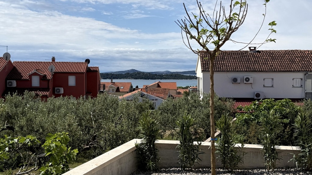 Sea view from terrace overlooking coast and neighborhood