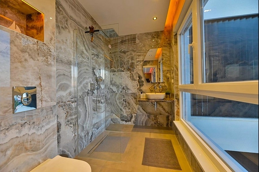 Modern bathroom with a natural stone look