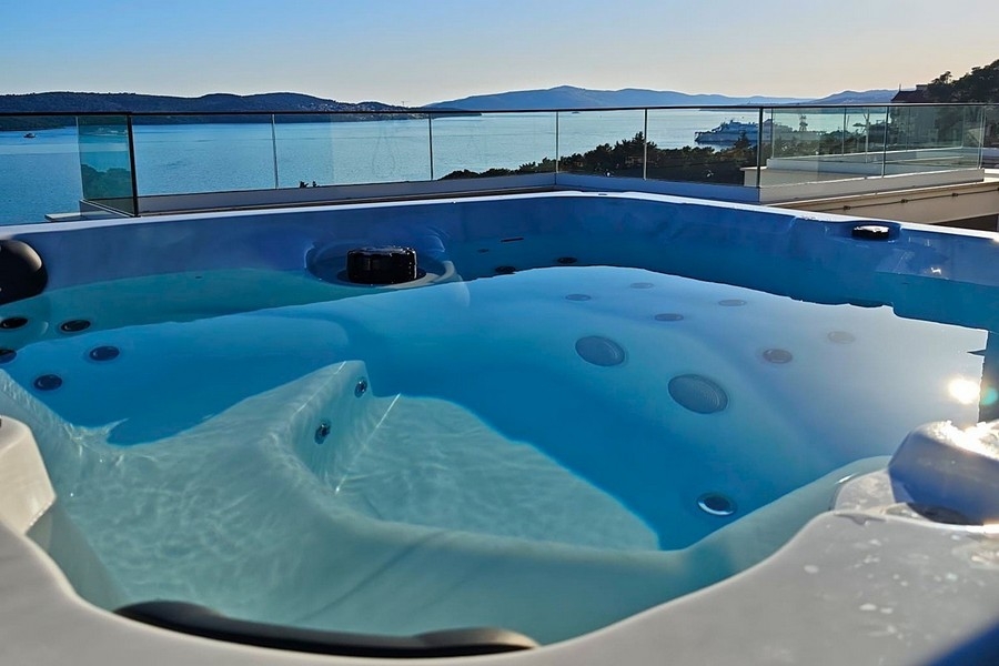 Jacuzzi on roof terrace with sea views
