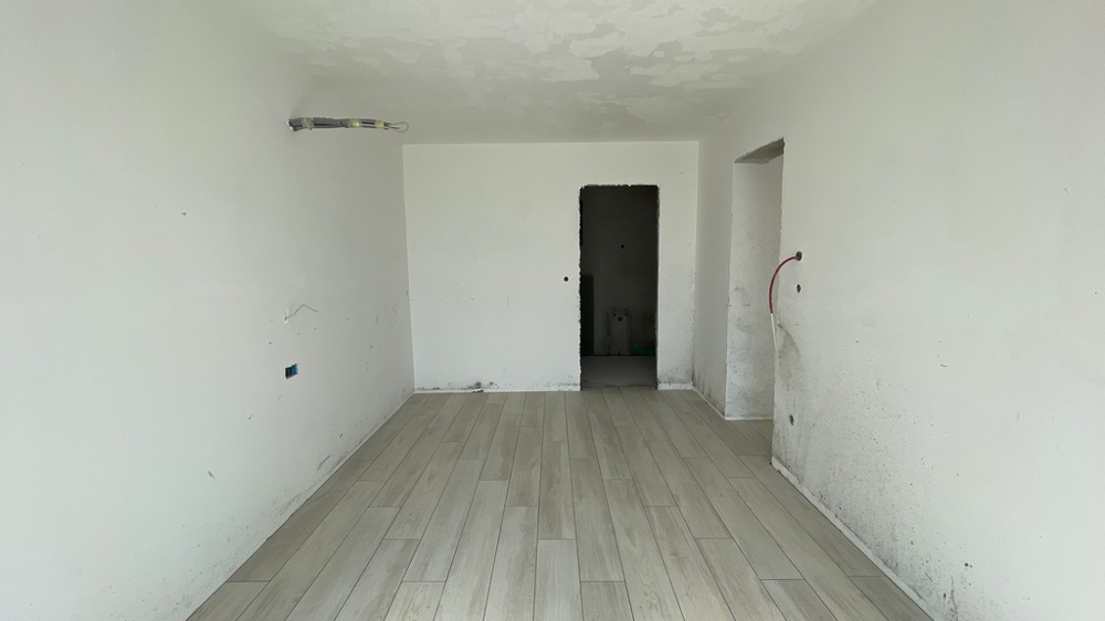 Interior in shell condition with prepared kitchen area