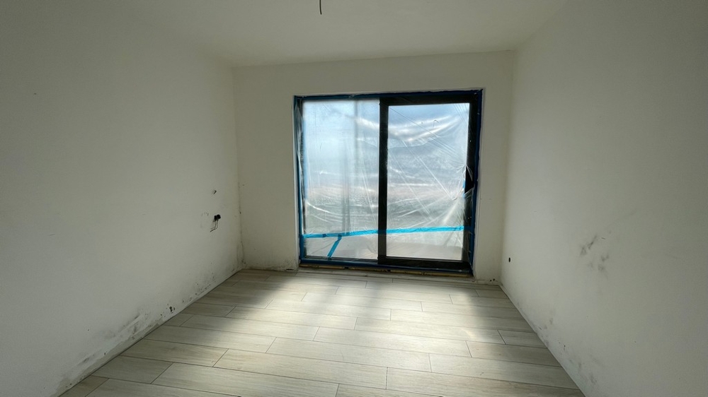 Room with access to a large window and lots of light