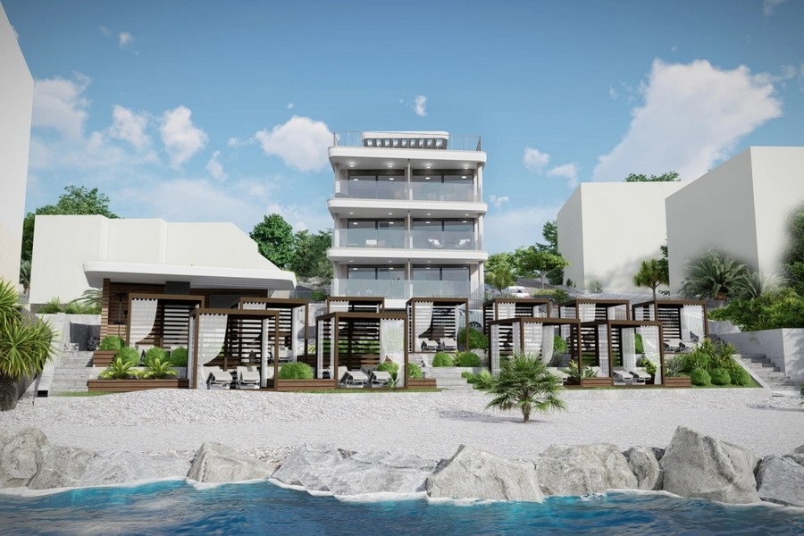 Modern residential building in the first row to the sea with a beach area in Croatia