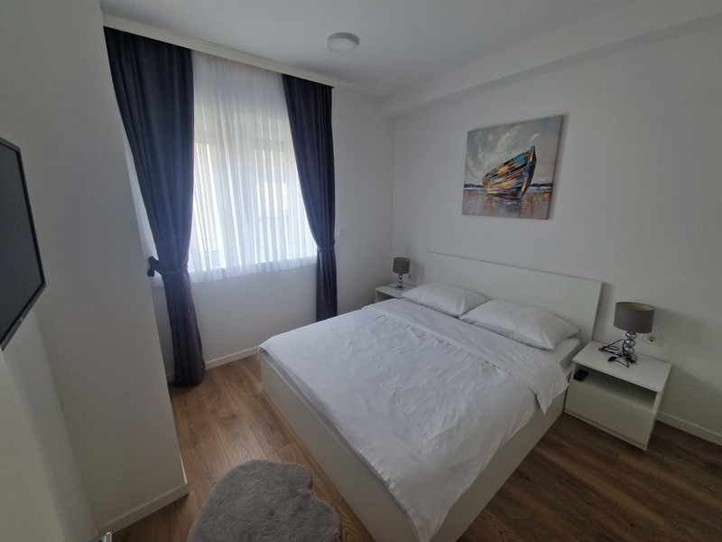 Bright bedroom with double bed
