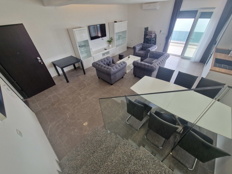 Open living area with access to the terrace