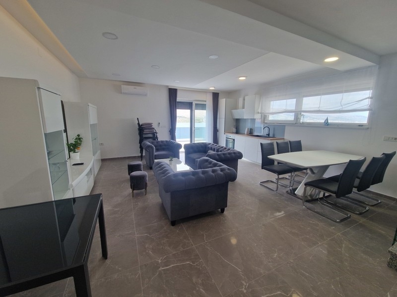 Modern furnishings in the living and kitchen areas