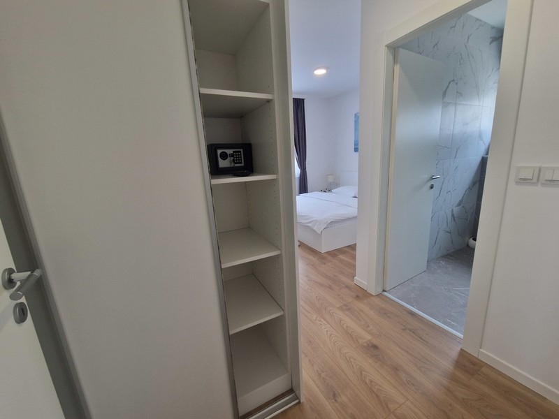 Hallway with access to the bedroom and bathroom