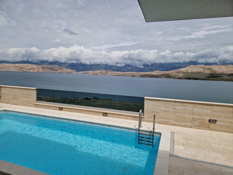Swimming pool with sea view on the island of Pag