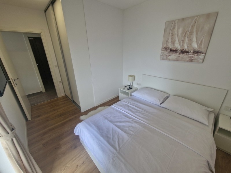 Bedroom with double bed and built-in wardrobe