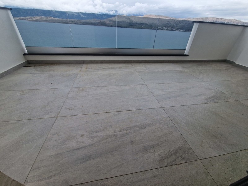 Sea view from the terrace of the modern apartment on Pag